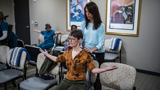 MS patients do yoga at the multiple sclerosis wellness program at Shepherd Center
