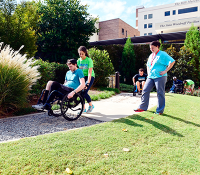 A patient participants in the Advanced Wheelchair Skills Clinic.