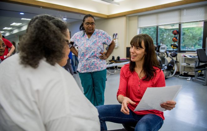 Shepherd Center multiple sclerosis provider talks to patient about the bowel and bladder clinic