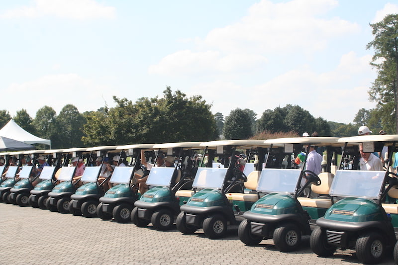 Golf carts lined up at largest charity golf tournament in Atlanta
