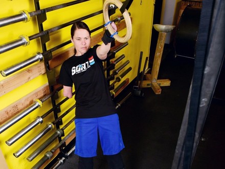 Former Shepherd Center patient, Cindy Martinez, exercises at a gym. 