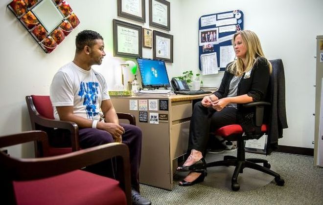  Shepherd Director of Psychology, Laurie Nash, sits in her office with patient, Quinn Hogan