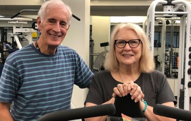 Doyle Mote poses with his Fitness Buddy Donna Luttrell at Shepherd Center's ProMotion Fitness Center.