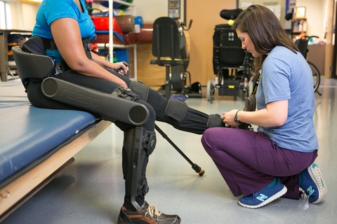 Patient being fitted with Indego exoskeleton at Shepherd Center